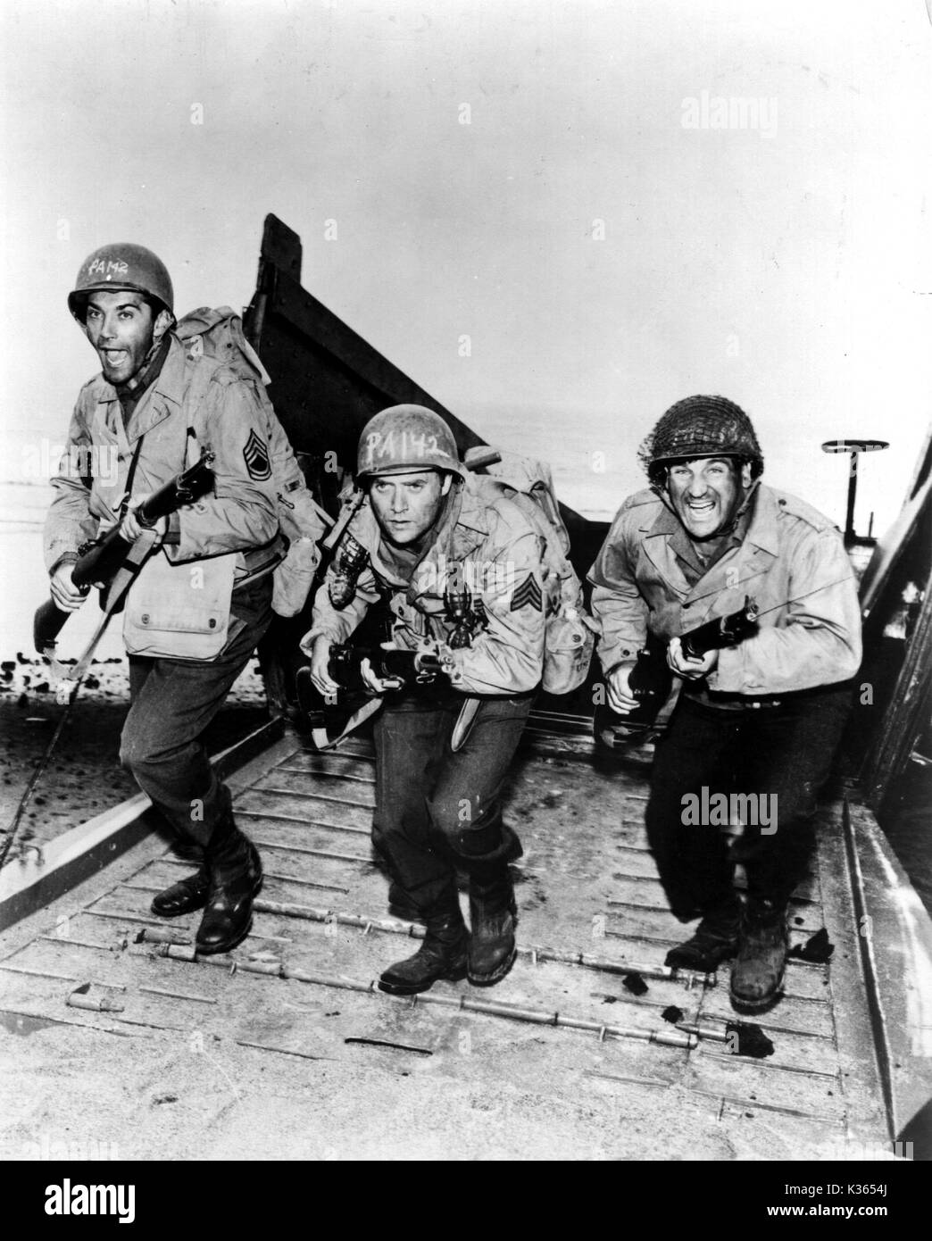 COMBAT From left to right Rick Jason (as Lt. Hanley); Vic Morrow (as