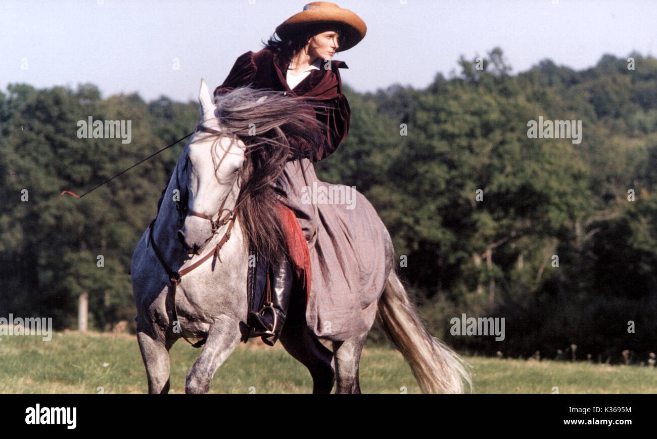 LES ENFANTS DU SIECLE JULIETTE BINOCHE AS GEORGES SAND HORSE RIDING     Date: 1999 Stock Photo