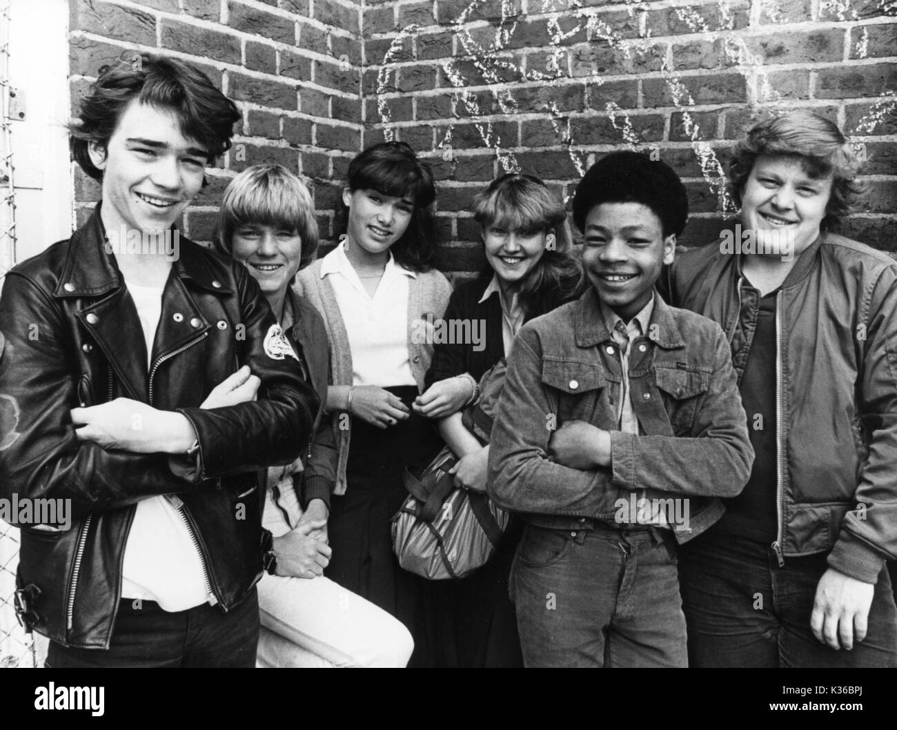 GRANGE HILL TODD CARTY AS TUCKER, PAUL McCARTHY AS TOMMY WATSON, RENE ALPERSTEIN AS PAMELA CARTWRIGHT, LINDA SLATER AS SUSI McMAHON, TERRY SUE PAT AS BENNY GREEN AND GEORGE ARMSTRONG AS ALAN HUMPHRIES Stock Photo
