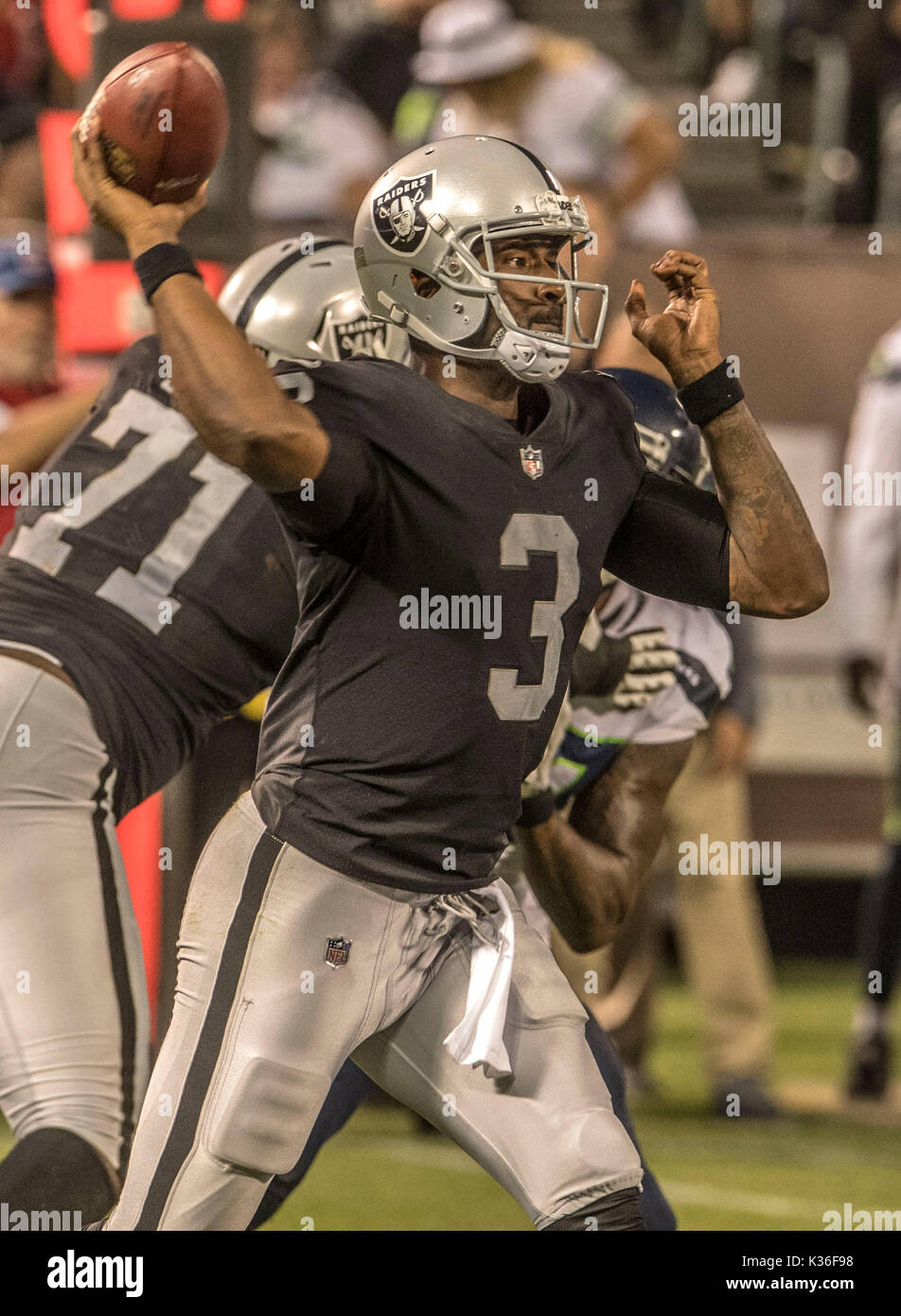 August 31, 2017: Oakland Raiders quarterback EJ Manuel (3) fires pass down field on Thursday, August 31, 2017, at Oakland-Alameda County Coliseum in Oakland, California. The Seahawks defeated the Raiders in a preseason game 17-13. Al Golub/CSM Stock Photo