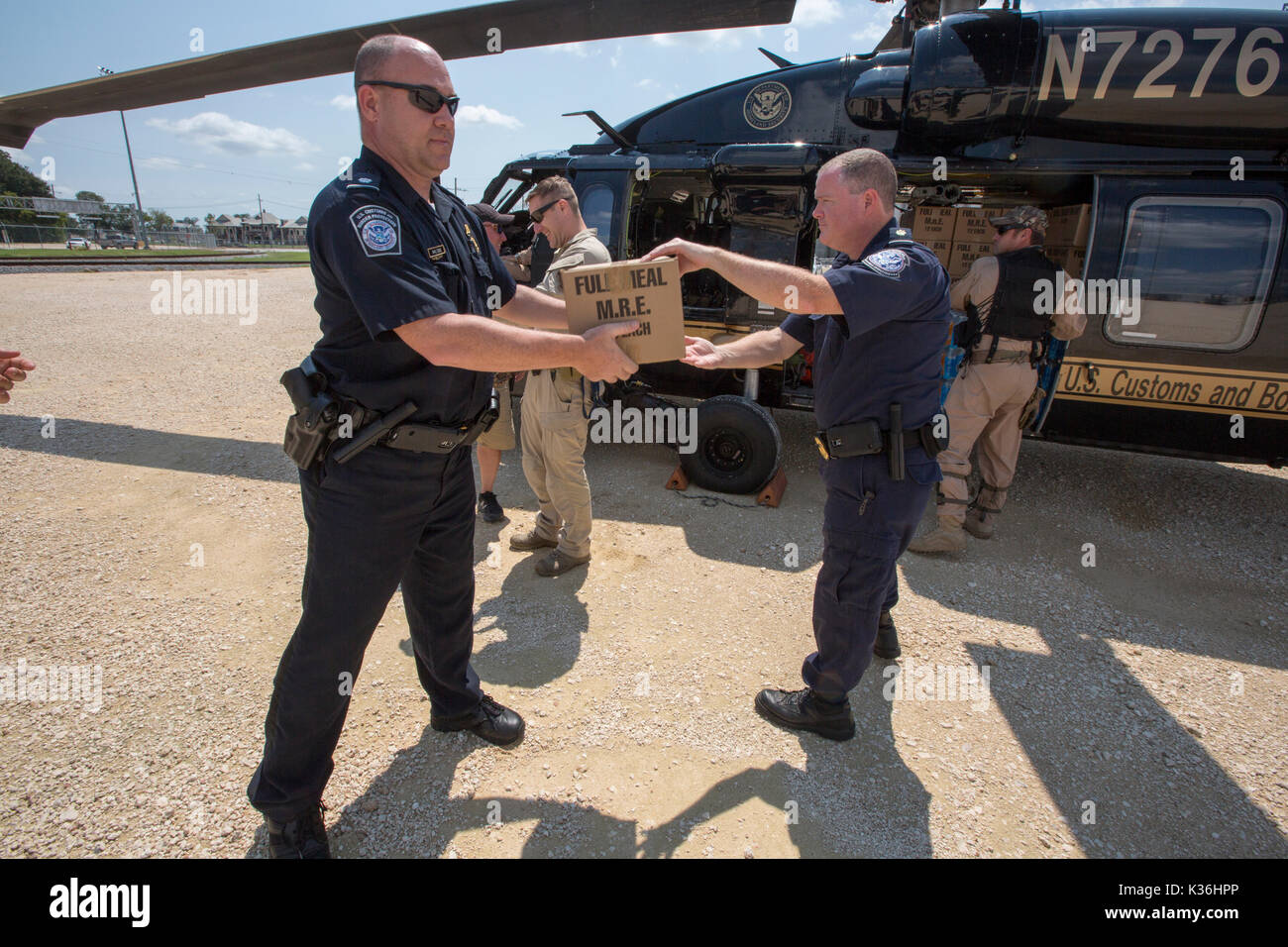 Houston, United States. 01st Sep, 2017. U.S CBP Air and Marine Operations aircrew unload water and packaged meals to Border Patrol Agents for distribution to residents suffering in the aftermath of Hurricane Harvey September 1, 2017 in Houston, Texas. Credit: Planetpix/Alamy Live News Stock Photo