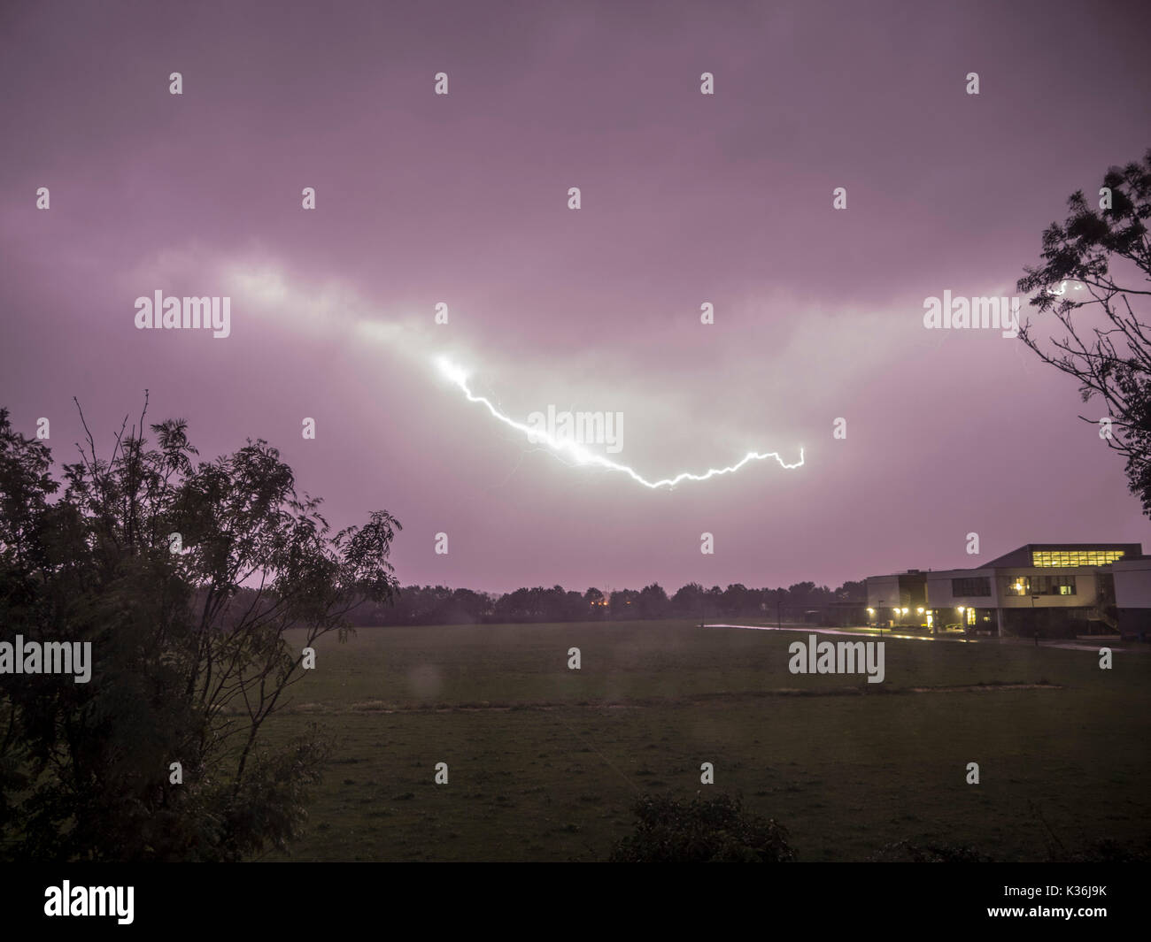Sheerness, Kent. 2nd Sep, 2017. UK Weather: lightning over Sheerness. Building pictured: Oasis Academy Isle of Sheppey (West Campus) and playing fields. Around midnight: strong winds, heavy rain and initially silent lightning, followed by thunder at 12.30 am when most of these pictures were taken. Credit: James Bell/Alamy Live News Stock Photo