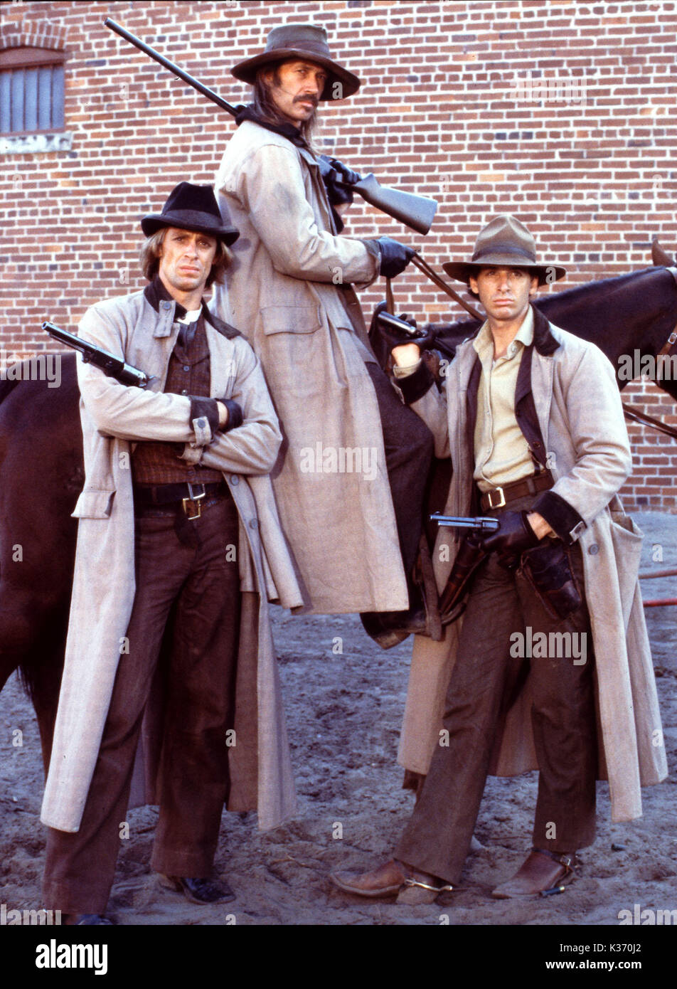 THE LONG RIDERS UNITED ARTISTS L-R, KEITH, DAVID AND ROBERT CARRADINE   THE LONG RIDERS UNITED ARTISTS L-R, KEITH, DAVID AND ROBERT CARRADINE     Date: 1980 Stock Photo