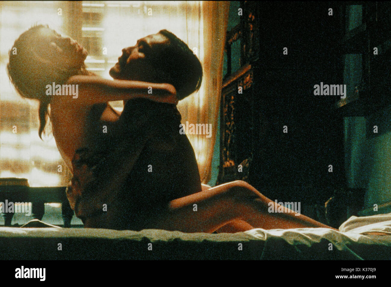 THE LOVER [FR/BR/VIETNAM 1992] aka L'AMANT JANE MARCH AND TONY LEUNG   THE LOVER     Date: 1992 Stock Photo
