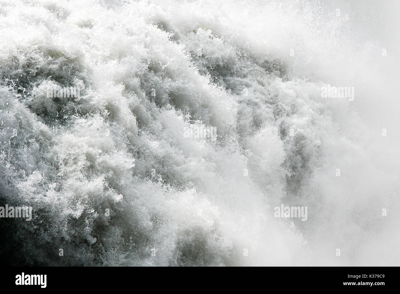 Raging waters of a big waterfall. Stock Photo