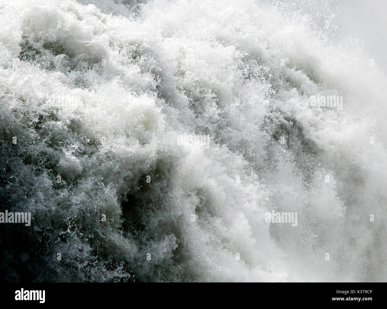 Raging waters of a big waterfall. Stock Photo