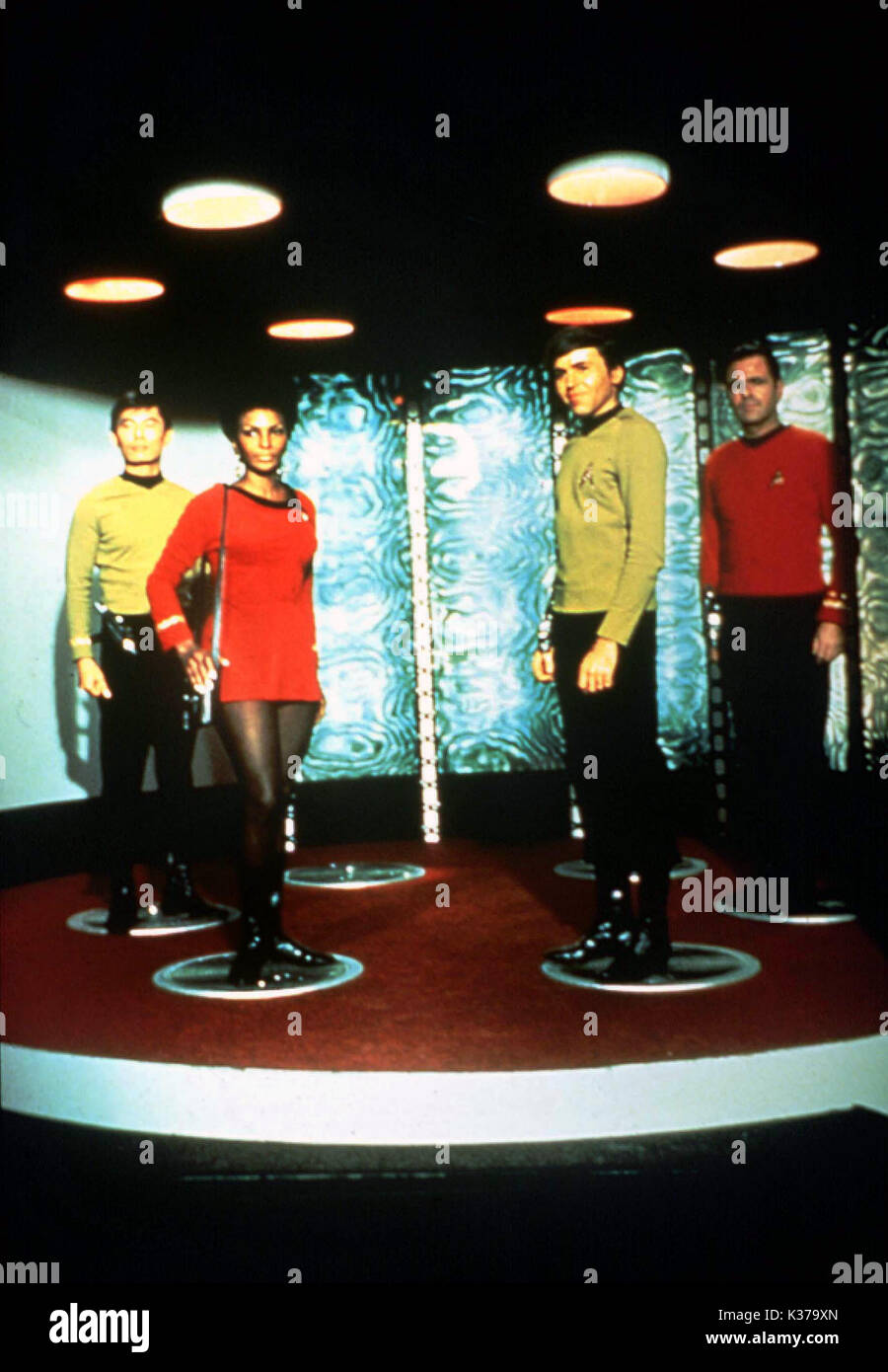 STAR TREK [US TV SERIES 1966 - 1969] GEORGE TAKEI as Sulu, NICHELLE NICHOLLS as Lieutenant Uhura, WALTER KOENIG as Chekov, JAMES DOOHAN as 'Scotty' STAR TREK Stock Photo