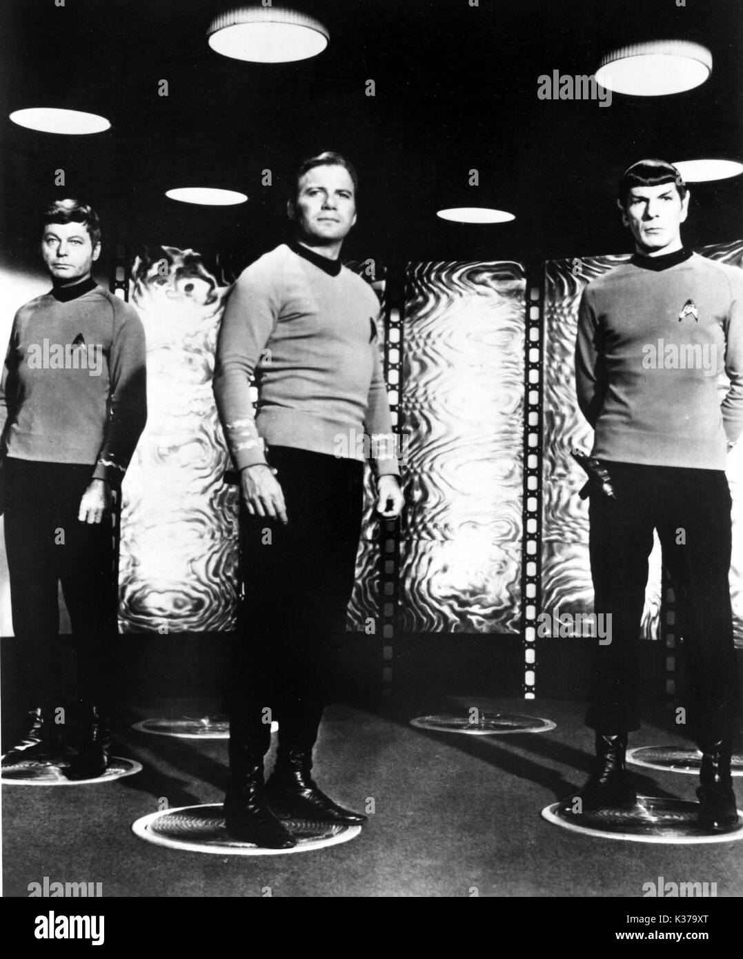 STAR TREK DEFOREST KELLY as Dr McCoy aka Bones, WILLIAM SHATNER as Captain James T Kirk, LEONARD NIMOY as Mr Spock STAR TREK Stock Photo