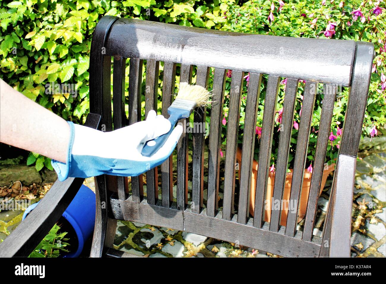 An image of a Garden furniture painting Stock Photo Alamy
