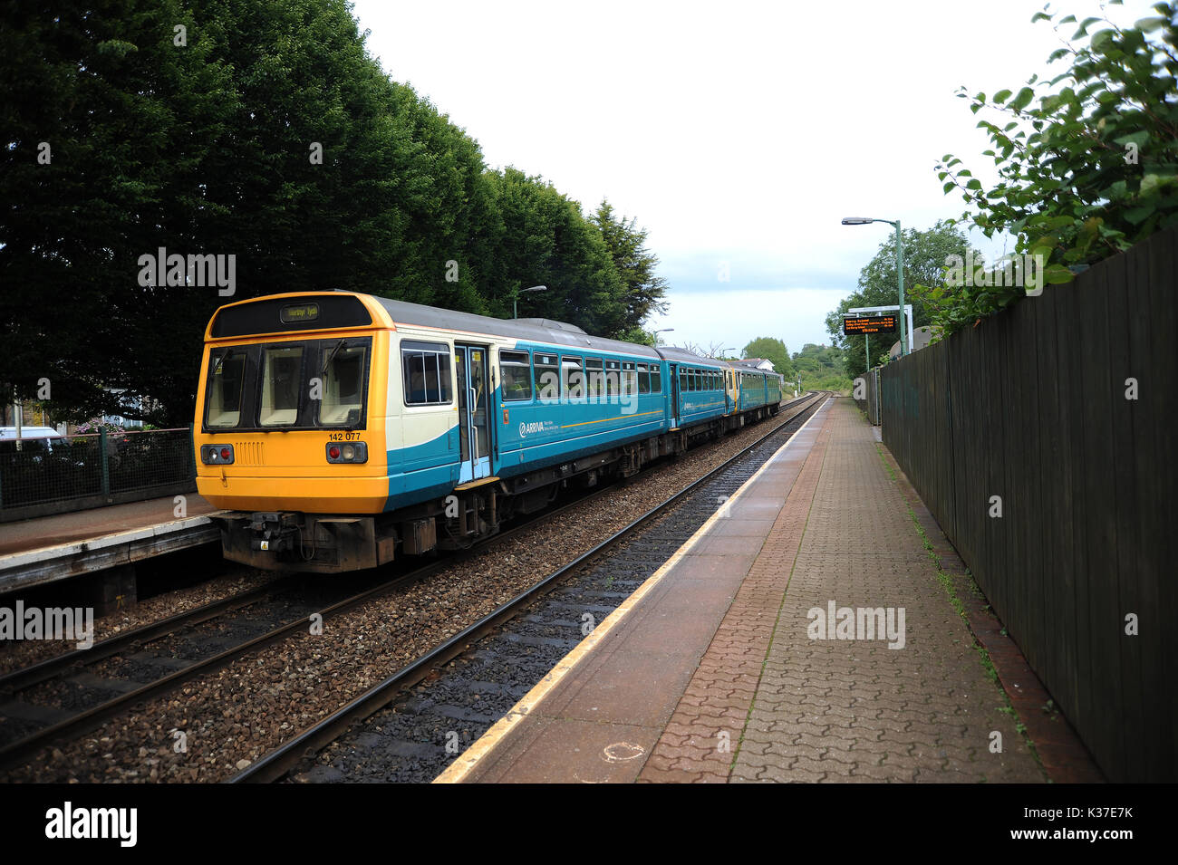 142077 (nearest camera) and 143625 at Eastbrook station with a service for Merthyr Tydfil. Stock Photo