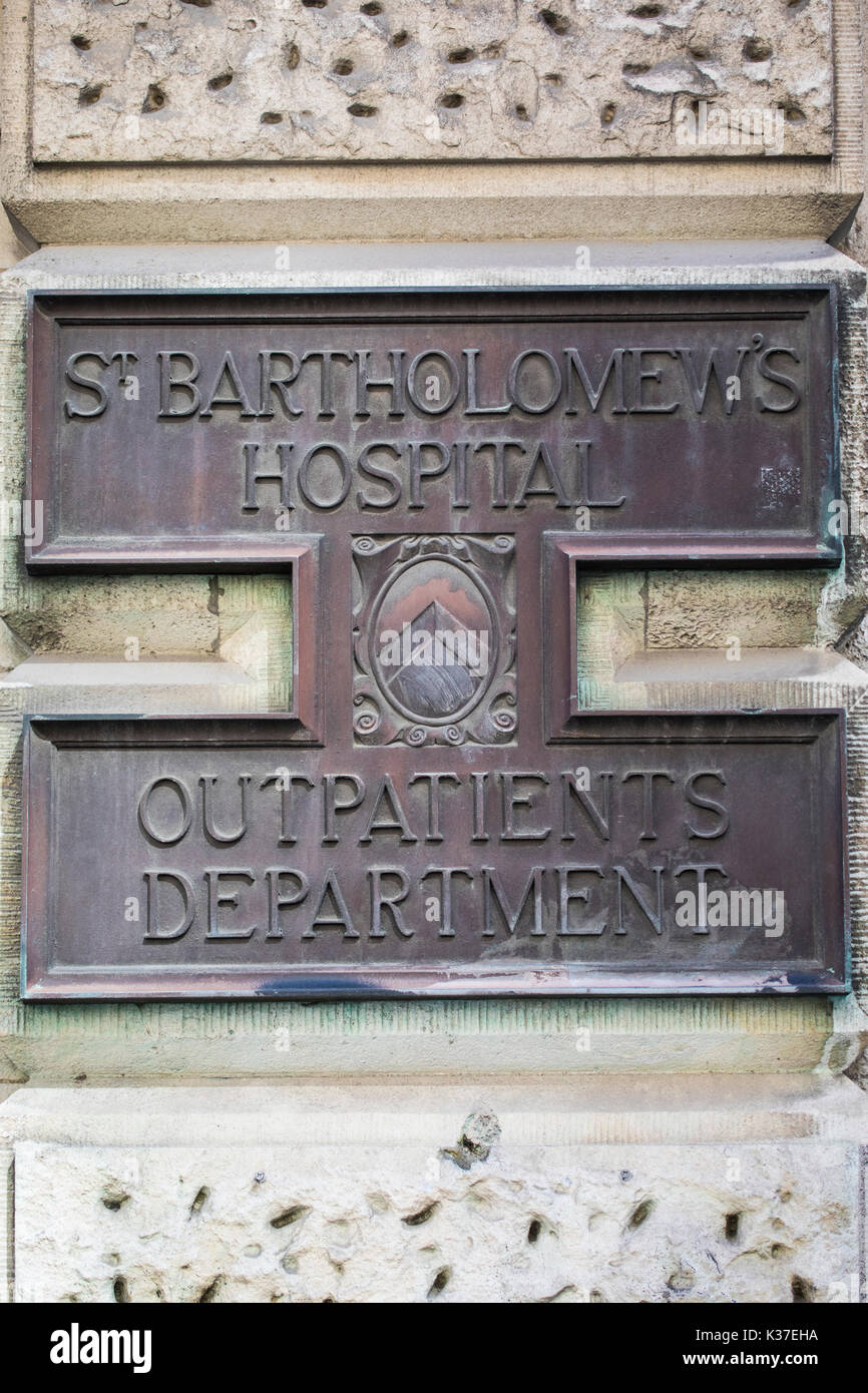 LONDON, UK - AUGUST 11TH 2017: A metal plaque on the exterior of St. Bartholomews Hospital in the City of London, on 11th August 2017. Stock Photo
