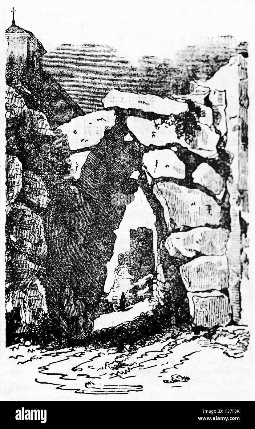 Strong stone entrance to a ancient town similar to a cave, Arpino acropolis portal Lazio Italy. Old Illustration by unidentified author published on Magasin Pittoresque Paris 1834 Stock Photo