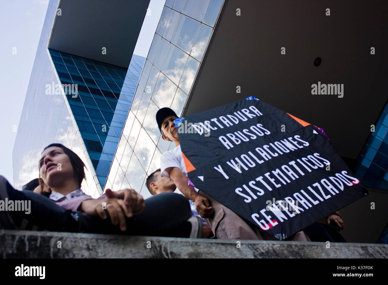 A demonstrator holds a kite during a protest against the government of Nicolás Maduro. Stock Photo