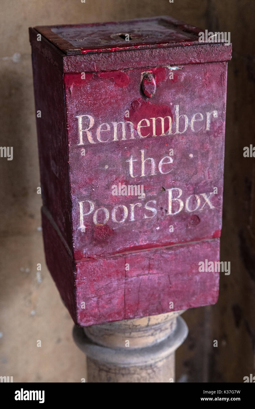 A Remember the Poors Box located at St. Bartholomews Hospital in London, UK.  Before the National Health Service, the sick were dependent on charity a Stock Photo