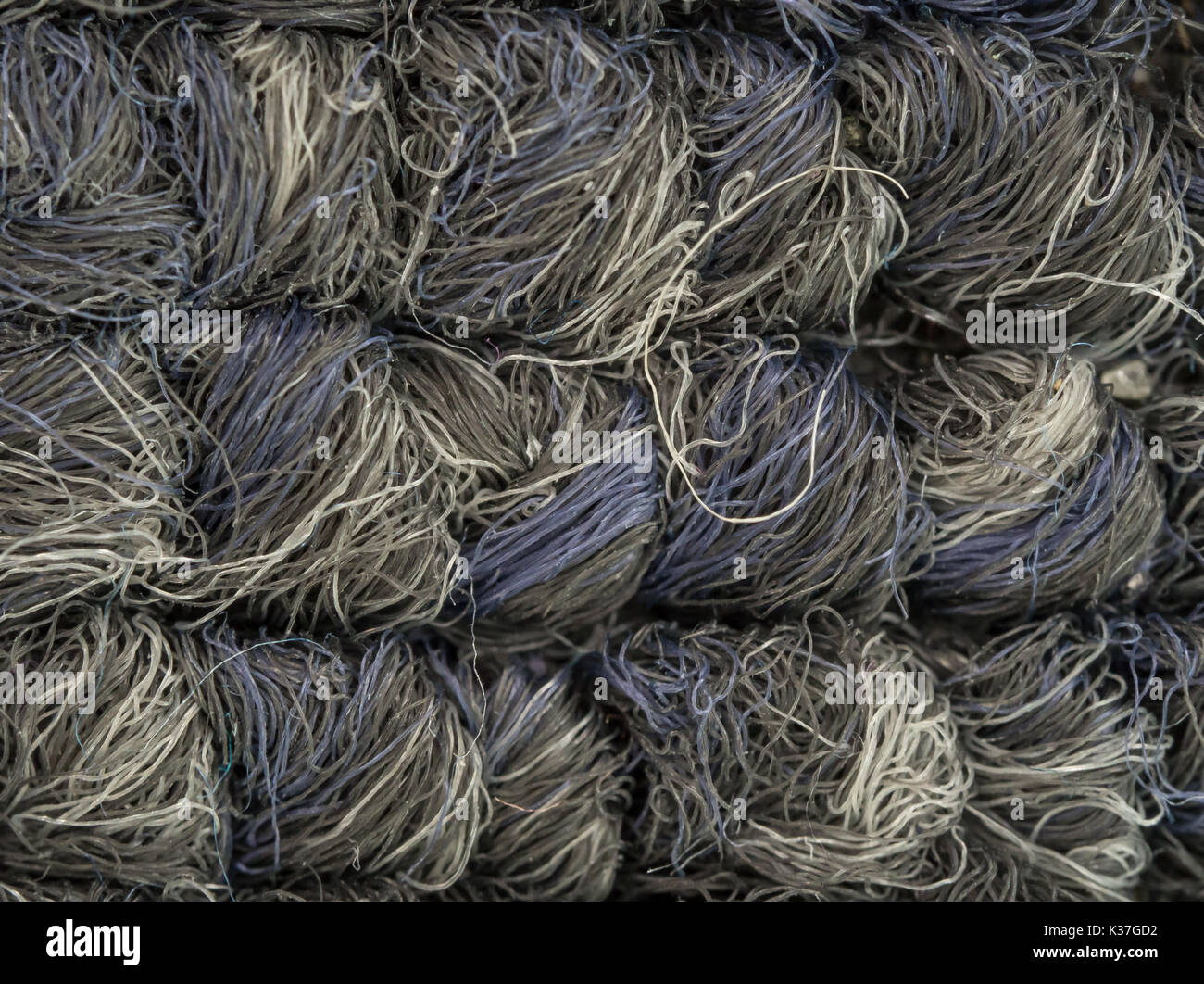 gray and white carpet fibers, macro Stock Photo Alamy