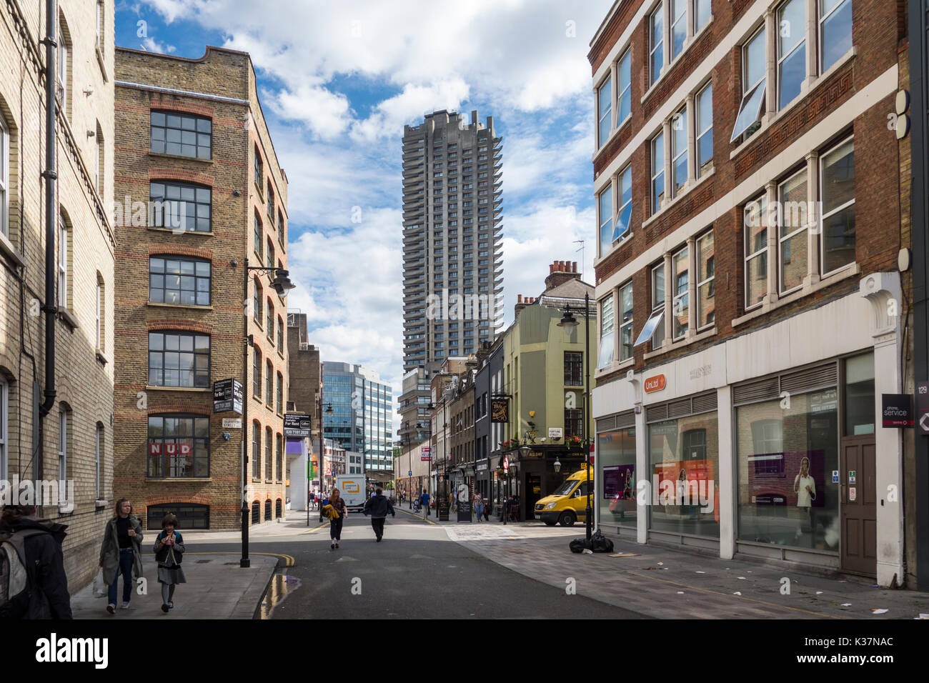 View of Cromwell Tower, Barbican Estate from Whitecross Street, London, UK Stock Photo