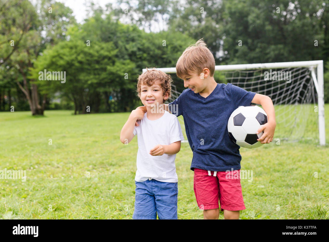 Two little boy playing football hires stock photography and images Alamy