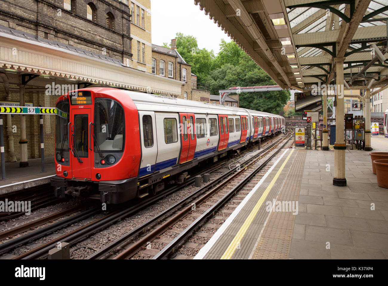 District Line train at High Street Kensington Underground station in