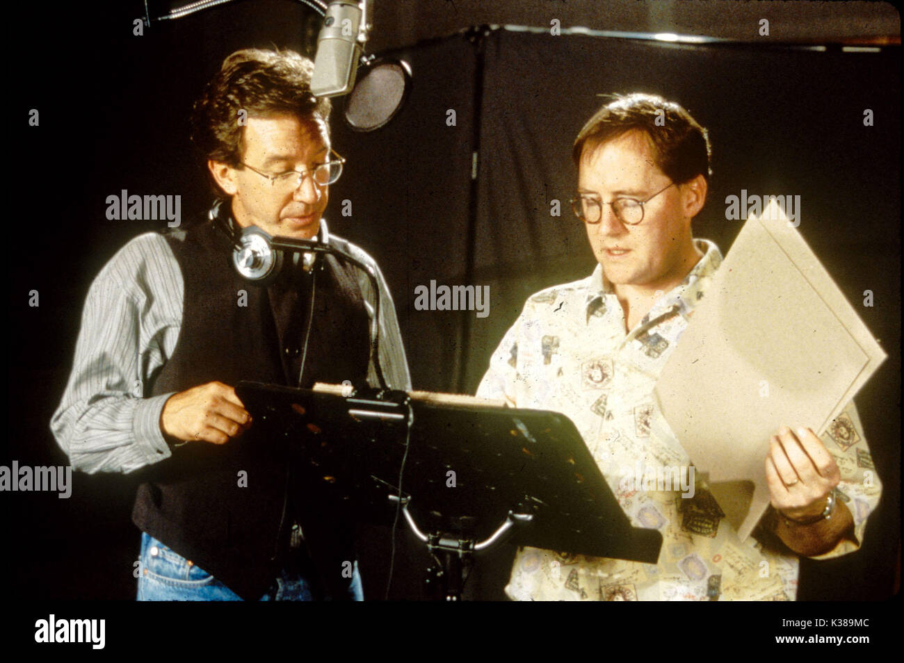 TOY STORY WALT DISNEY PICTURES/PIXAR ANIMATION STUDIOS TIM ALLEN with JOHN LASSETER, director     Date: 1995 Stock Photo