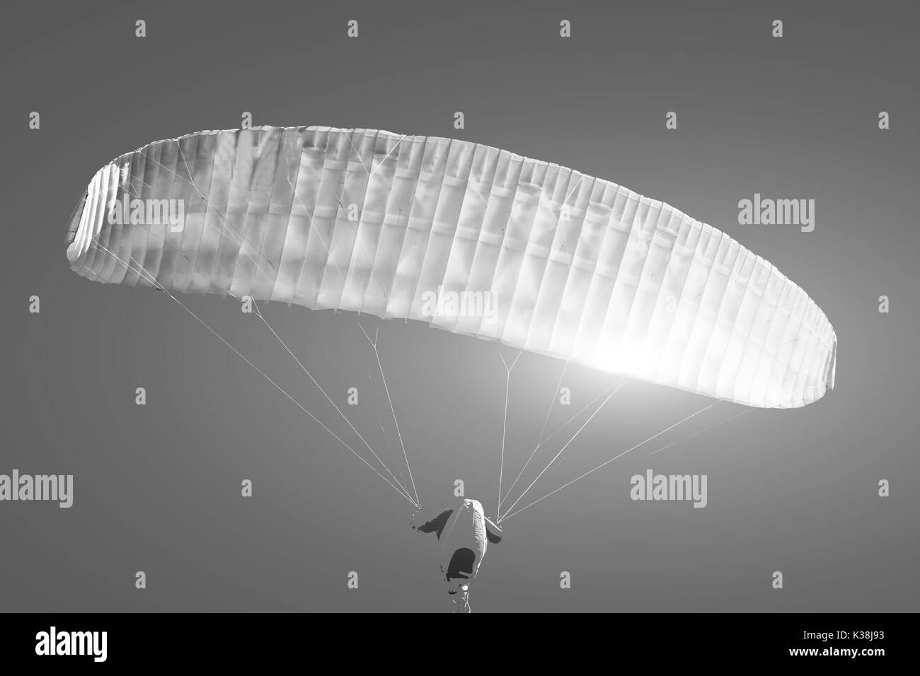 Paragliding in the sunset in Denmark near Løkken Stock Photo
