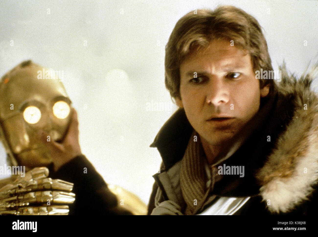 STAR WARS: EPISODE V - THE EMPIRE STRIKES BACK C-3PO performed by ANTHONY DANIELS, HARRISON FORD as Han Solo STAR WARS: EPISODE V - THE EMPIRE STRIKES BACK Stock Photo