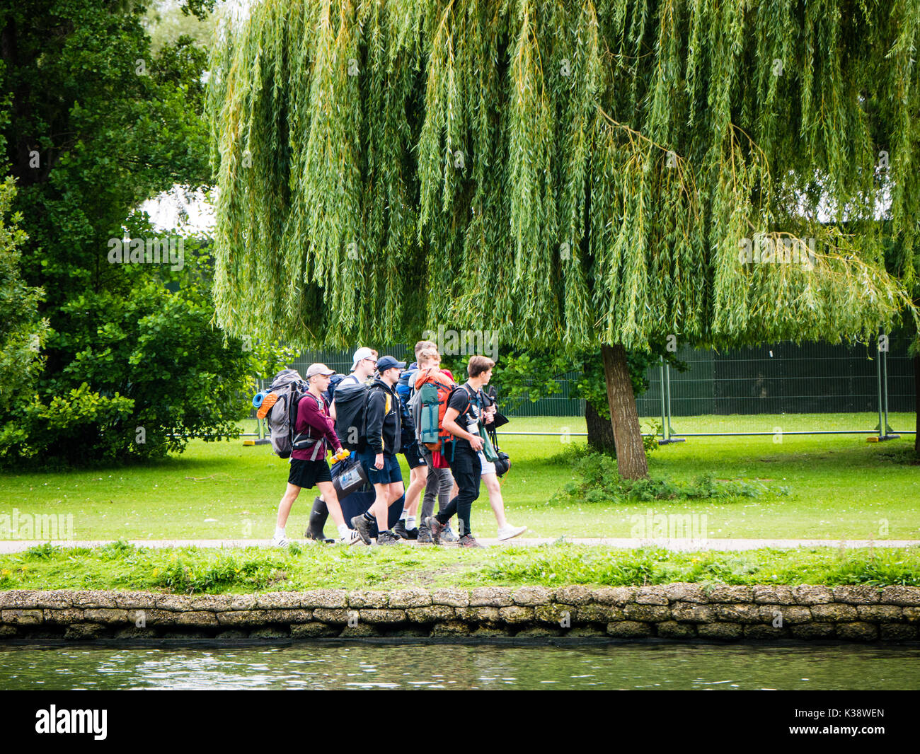 Audience on Way To Reading Festival, Banks of River Thames, Reading, Berkshire, England Stock Photo