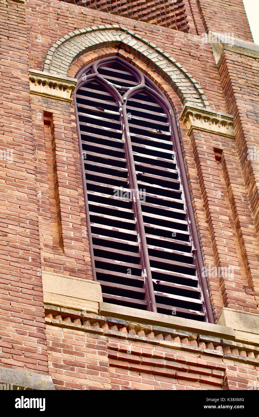 Old brick church bell tower showing weathering Stock Photo
