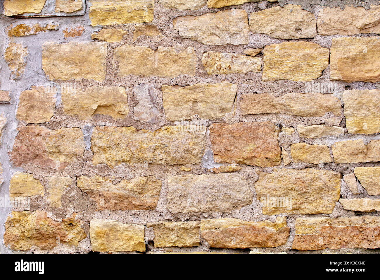 Limestone block wall with cement closeup as background Stock Photo Alamy
