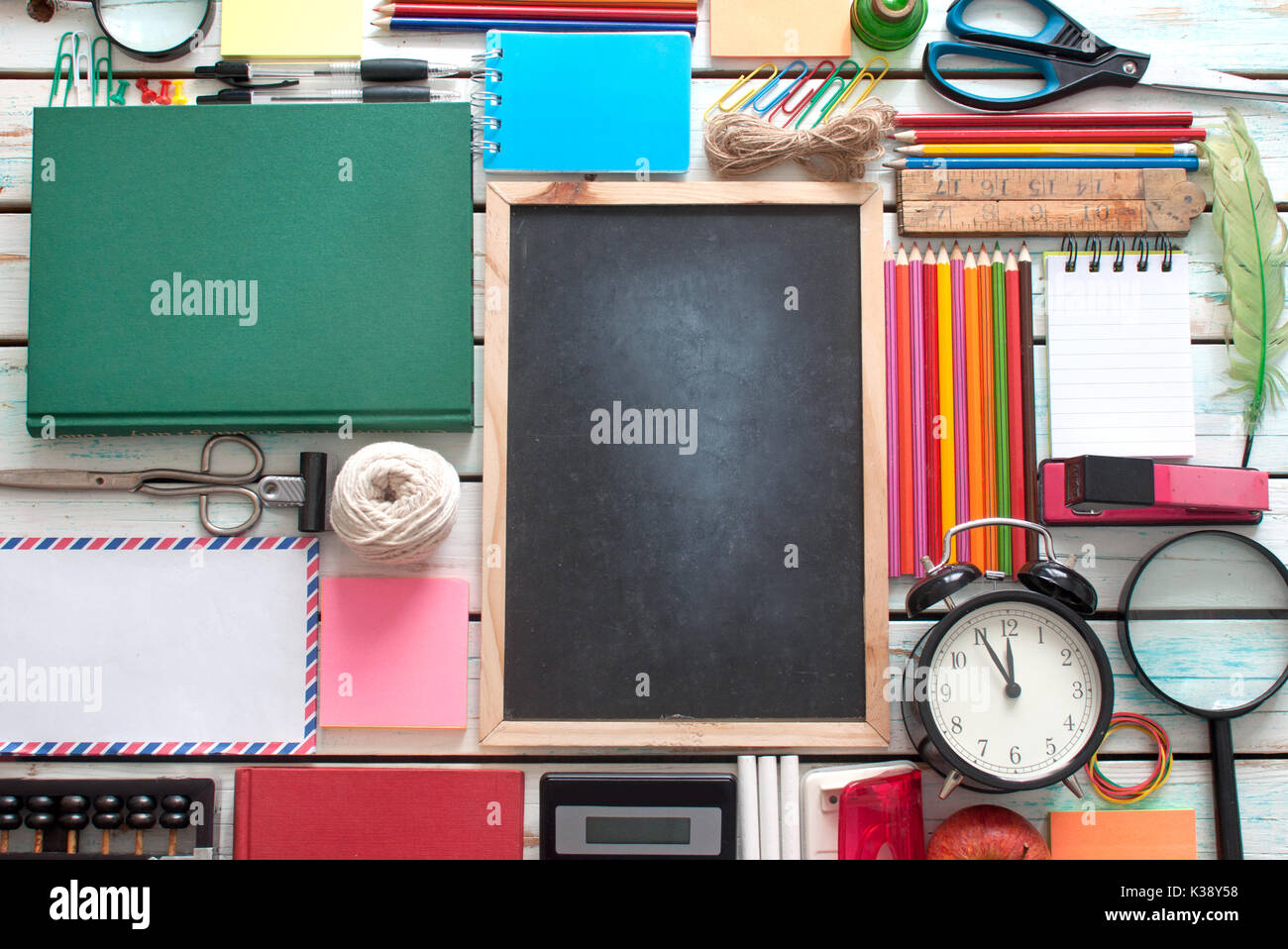 Aerial View Of Stationery Objects With Blackboard In The Centre Stock 