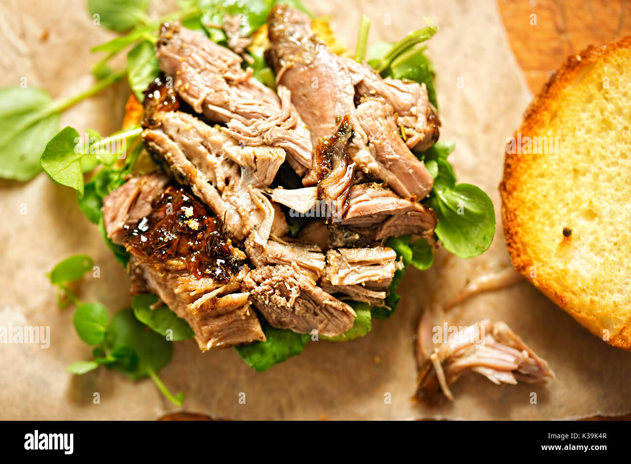 Slow cooked lamb & watercress burger Stock Photo