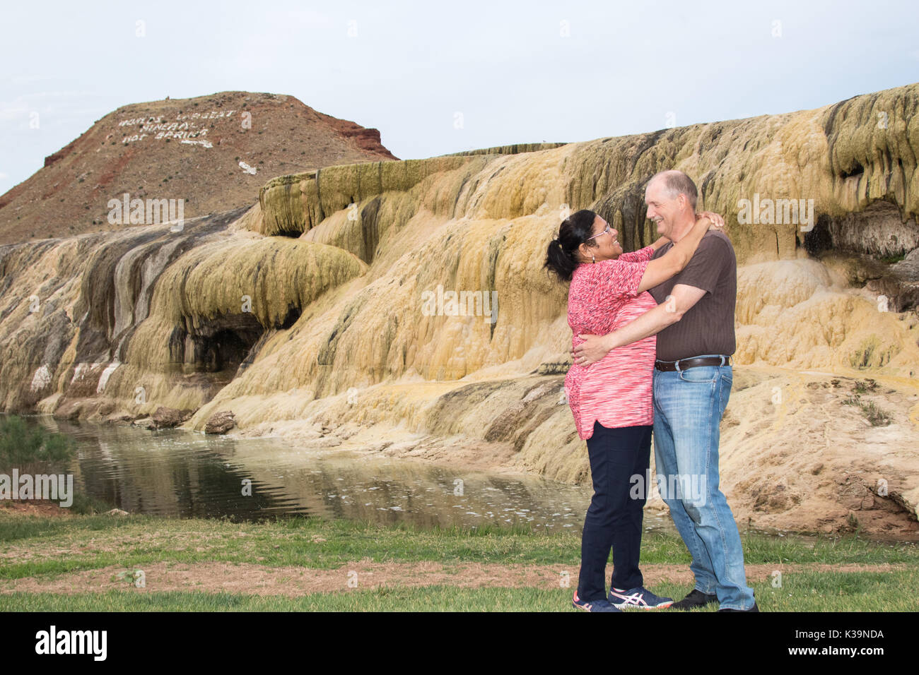 A happy couple at a geothermal terrace in Hot Springs State Park, Thermopolis, Wy Stock Photo