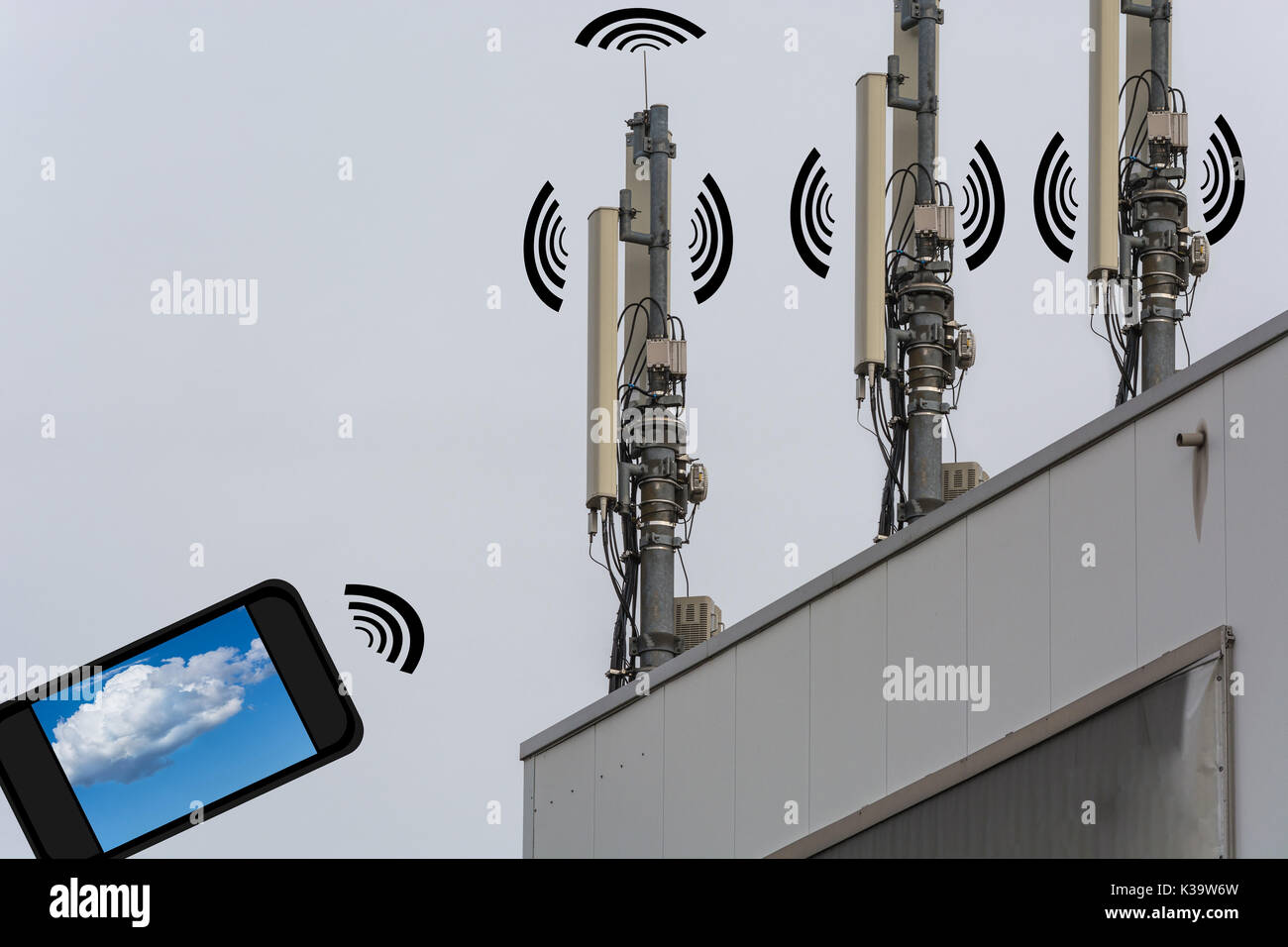 Antenna, telecommunications tower on a roof. Wireless telecommunication concept, home control by smartphone. Stock Photo