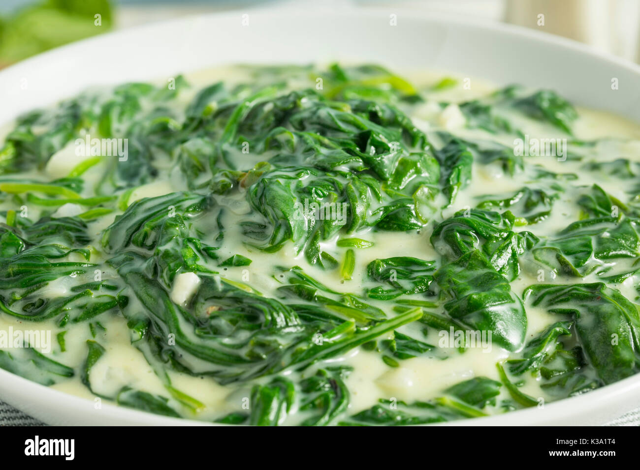 Creamy Homemade Creamed Spinach with Onion and Garlic Stock Photo - Alamy