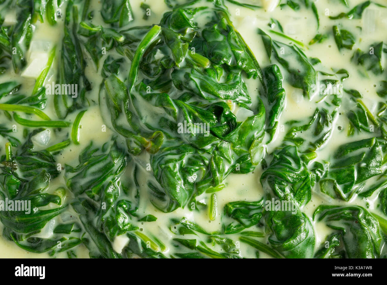 Creamy Homemade Creamed Spinach with Onion and Garlic Stock Photo - Alamy