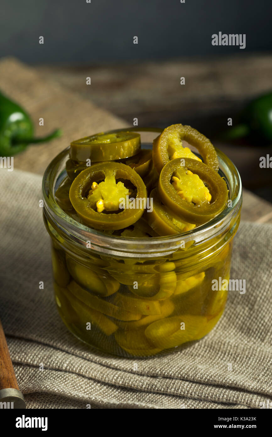 Green Organic Pickled Jalapenos in a Jar Stock Photo - Alamy