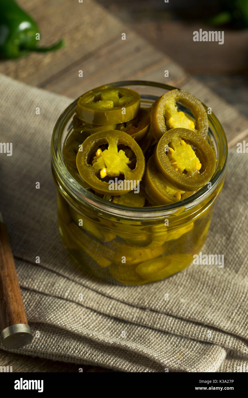 Green Organic Pickled Jalapenos in a Jar Stock Photo Alamy