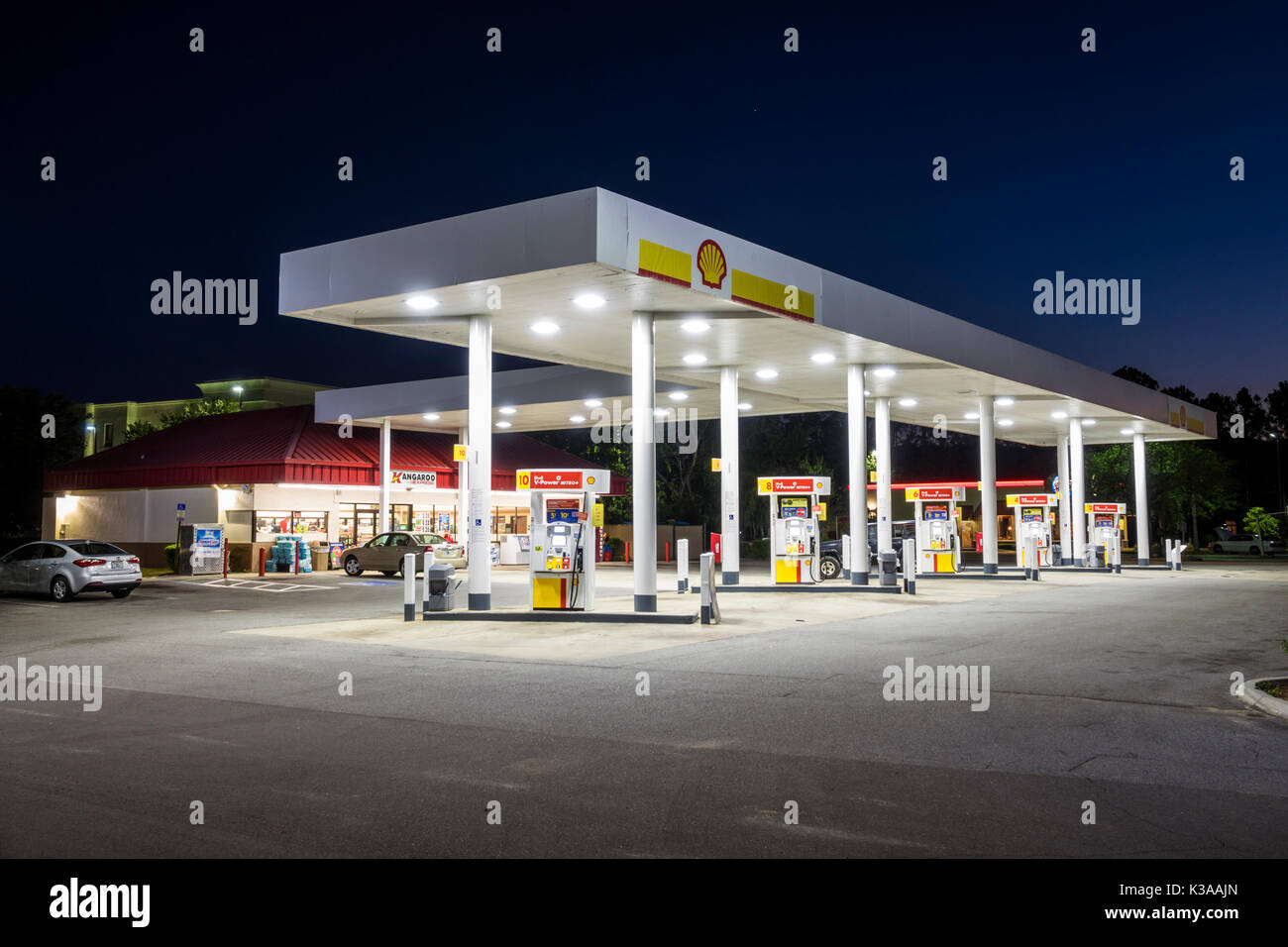 Florida,Palm Coast,Shell Gas,filling station,petrol,convenience store,pumps,overhead canopy,lighting,night,visitors travel traveling tour tourist tour Stock Photo