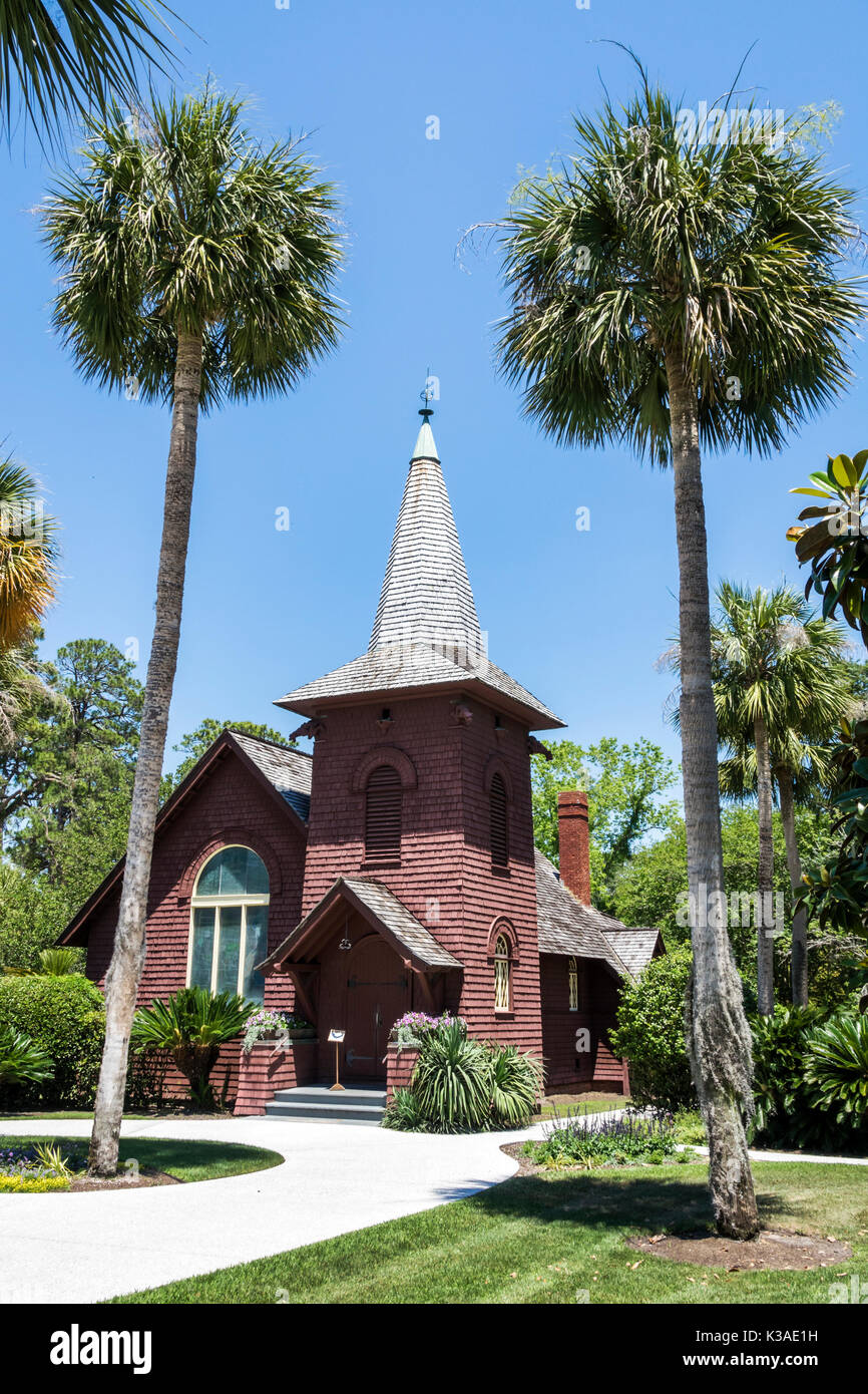 Georgia,Jekyll Island,barrier island,historic district,Faith Chapel,1904,exterior,garden,palm trees,visitors travel traveling tour tourist tourism lan Stock Photo