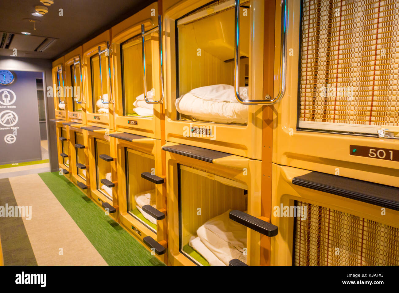 TOKYO, JAPAN JUNE 28 - 2017: Interior view of capsule hotel in city center. Capsule Hotels are less expensive structures very famous in Tokyo Stock Photo