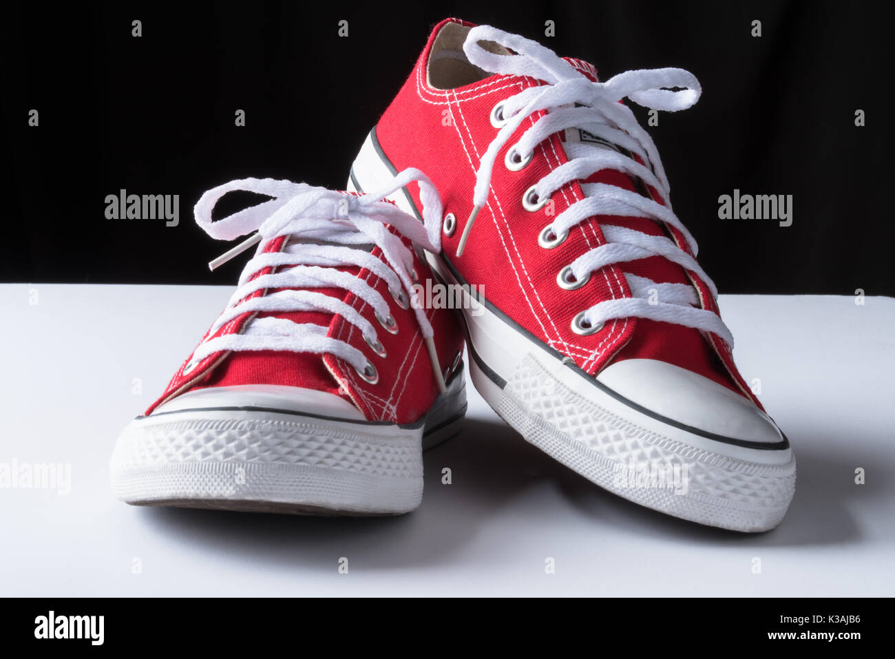 red canvas tennis shoes