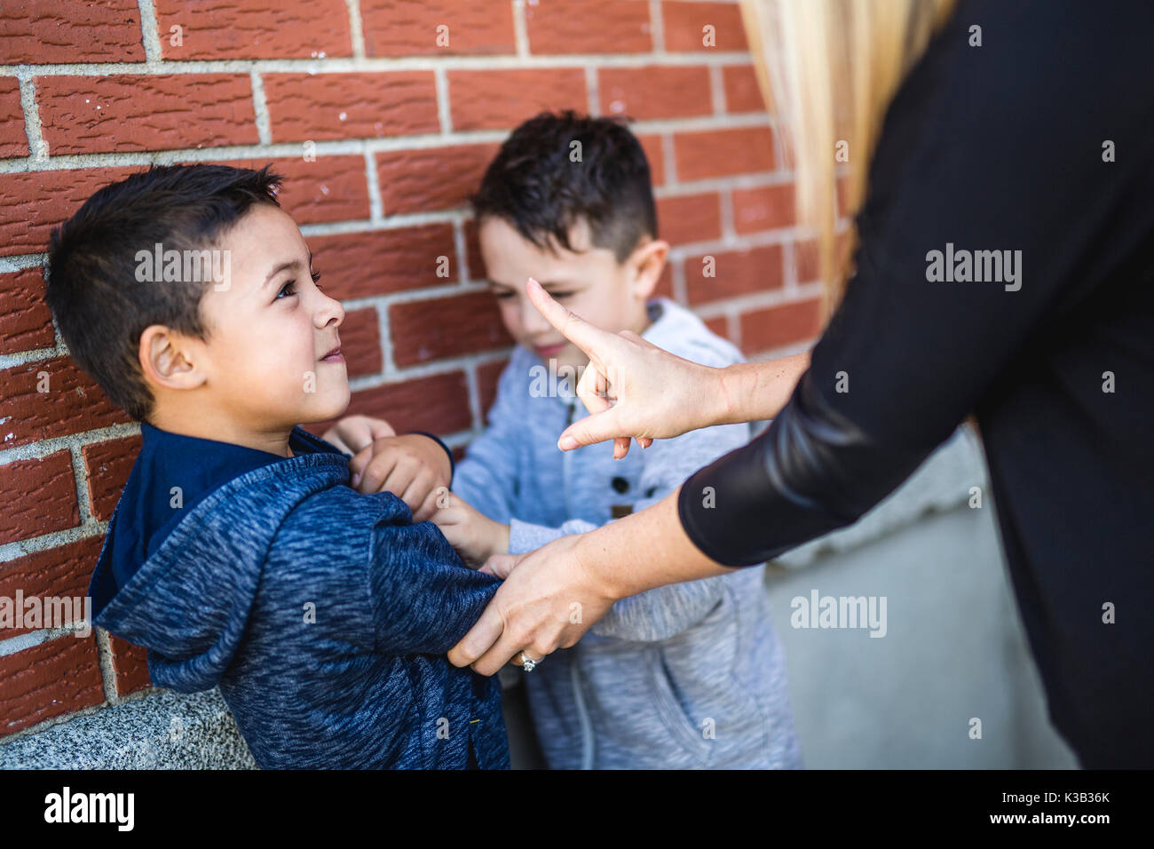 Teacher breaking up fight hi-res stock photography and images - Alamy