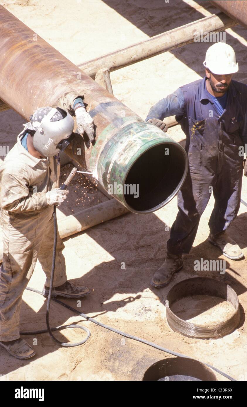 Oil rig drill floor action on an oil and gas exploration rig in the