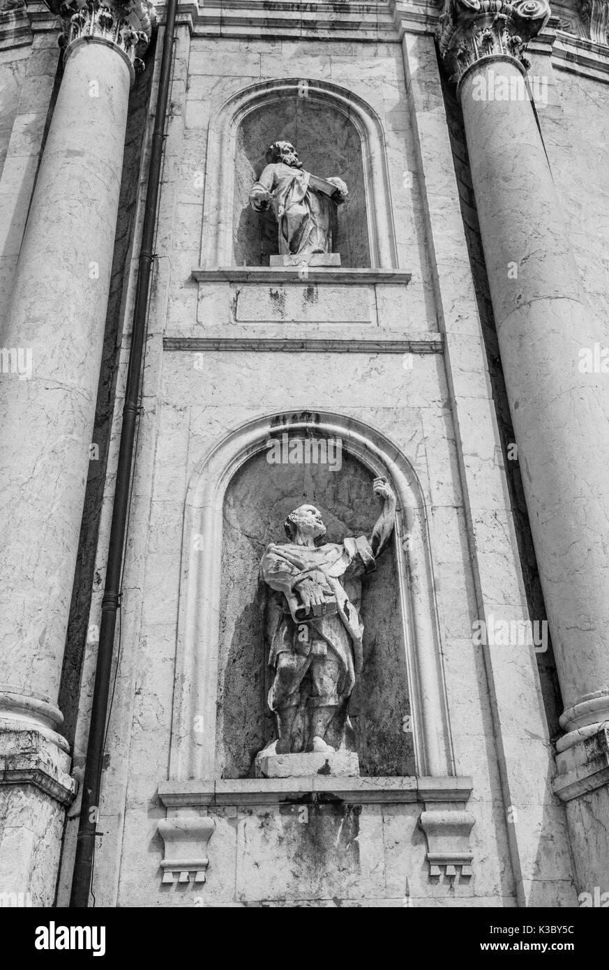 Germany, Bavaria, Ettal Benedictine monastery, statues at the Ettal Abbey church facade Stock Photo