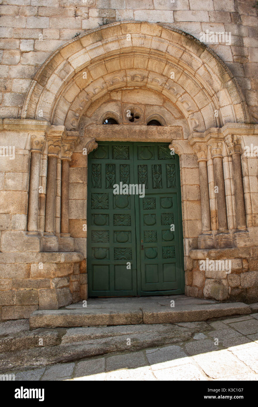 Santiago church in Ribadavia, detail of the romanesque front door with its arch and columns Stock Photo