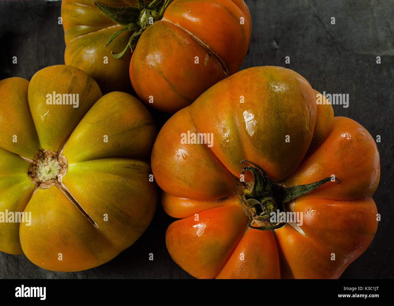 Tomatoes in a kitchen table top view Stock Photo