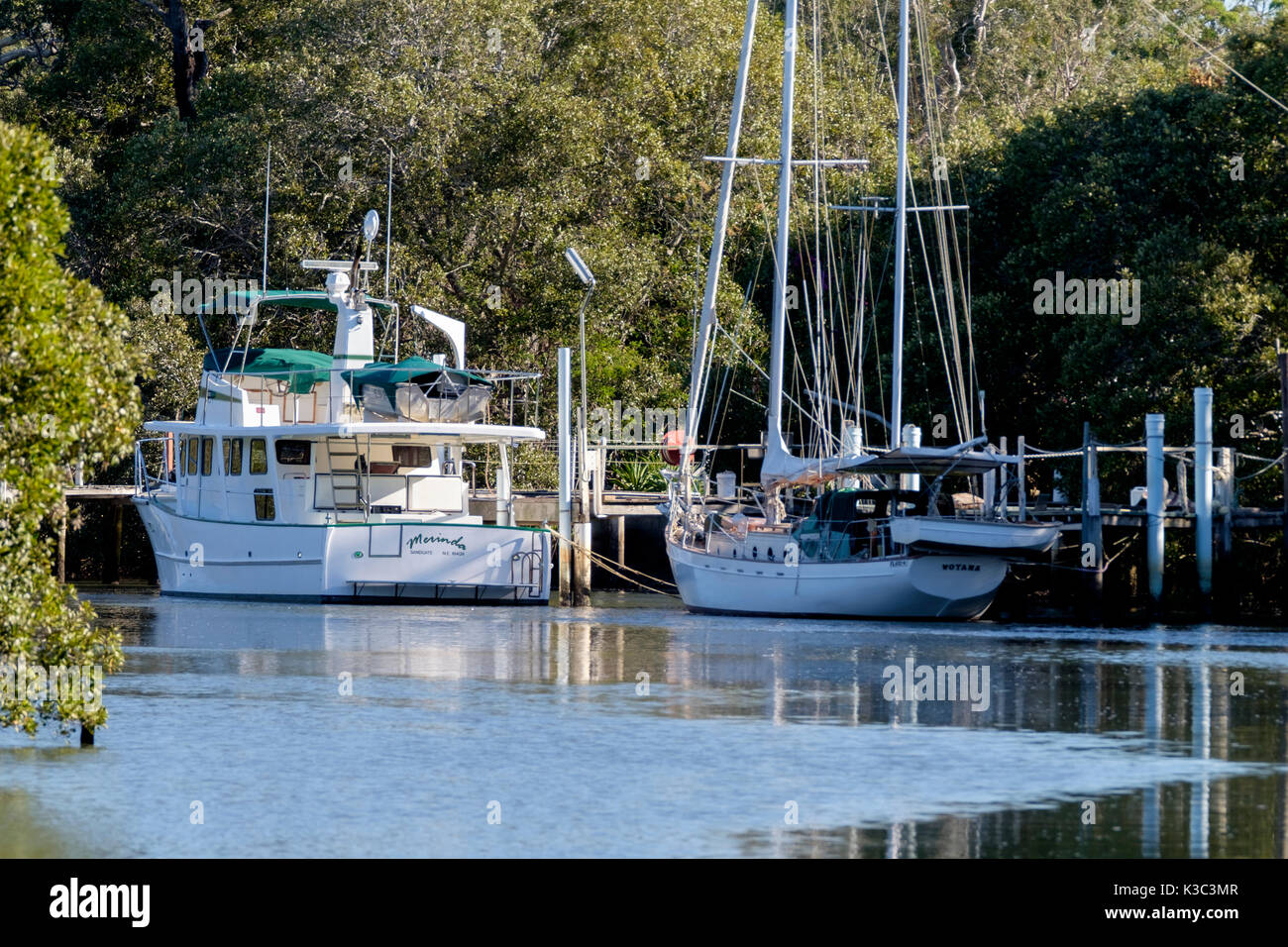 Boats moored on Cabbage Tree Creek Stock Photo Alamy