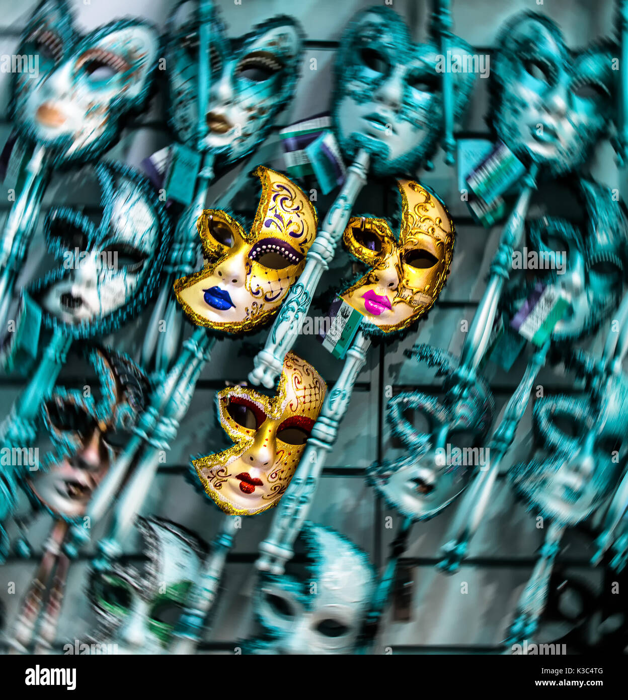 Abstract of italian face masks in blue and gold Stock Photo Alamy