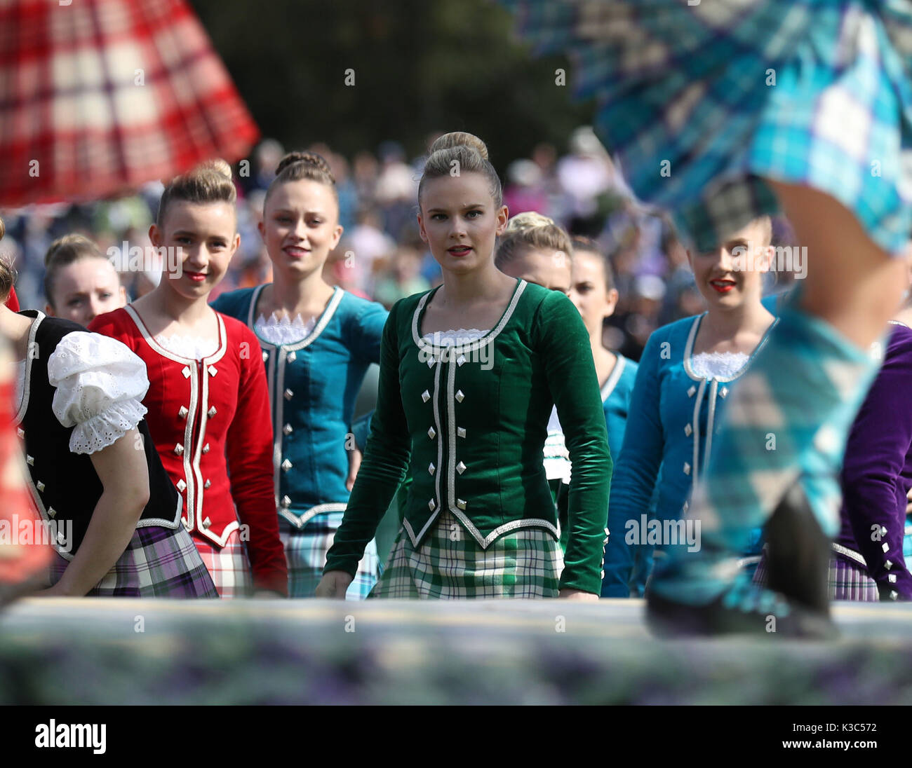Highland dancers view competitors during the Braemar Royal Highland ...