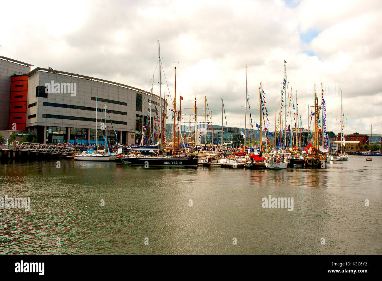 Pleasure boats moored in the marina at Belfast's Titanic Quarter beside the Odyssey Arena Stock Photo