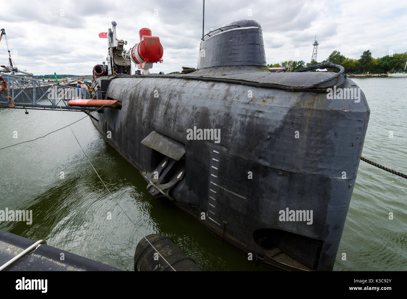 PEENEMUENDE, GERMANY - JULY 18, 2017: The Peenemuende seaport on the Baltic Sea island of Usedom and the Soviet Juliett-class submarine K-24 (U461). Stock Photo
